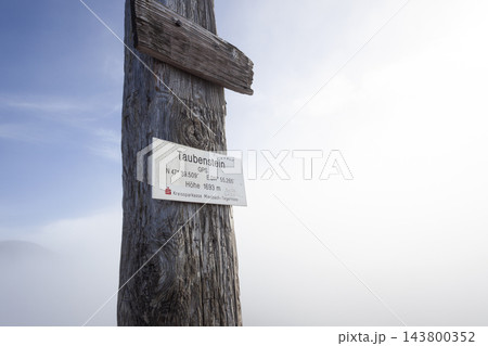 Summit cross  at Taubenstein mountain, Mangfall Mountains, Bavaria, Germany 143800352