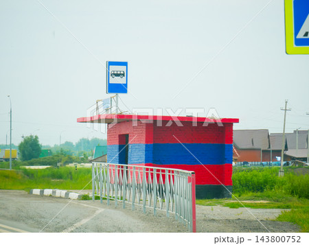 Painted Brick Bus Stop With Blue Sign Painted Brick Bus Stop With Blue Sign 143800752