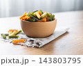 Dry tricolor fusilli pasta in bowl 143803795