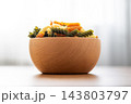 Dry tricolor fusilli pasta in bowl 143803797