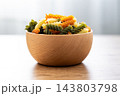 Dry tricolor fusilli pasta in bowl 143803798