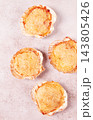 scallop, baked in shells, with cheese and spices, on the table, homemade, 143805426