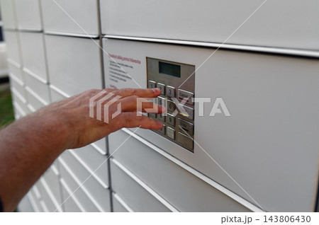 Modern Parcel Locker System with Electronic Access Terminal 143806430