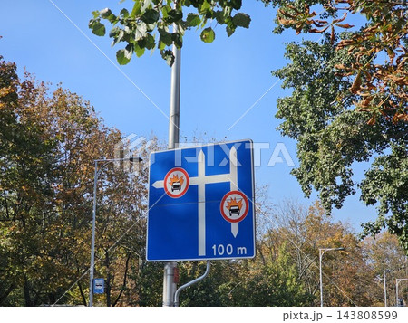 Blue Road Sign Showing Traffic Restrictions for Heavy Vehicles Blue Road Sign Showing Traffic Restrictions for Heavy Vehicles 143808599