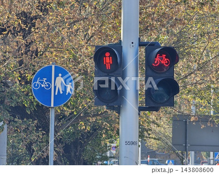 Red Pedestrian and Bicycle Traffic Lights at Urban Crossing 143808600