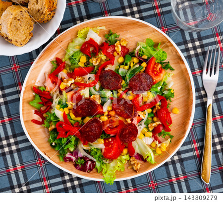 Salad with chorizo, corn and peppers Salad with chorizo, corn and peppers 143809279