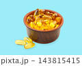 Omega 3. Golden omega fish oil capsules rest in a bowl. Nutrition concept focusing on health. 143815415