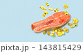 Omega 3. Salmon fillet is surrounded by vibrant fish oil capsules. 143815429