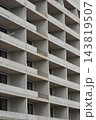 Unfinished concrete facade of residential building under construction 143819507