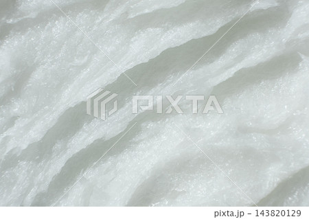 Detailed top view of unrefined solid coconut fat texture 143820129