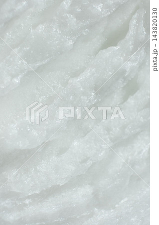Solid coconut oil texture top down vertical view Solid coconut oil texture top down vertical view 143820130