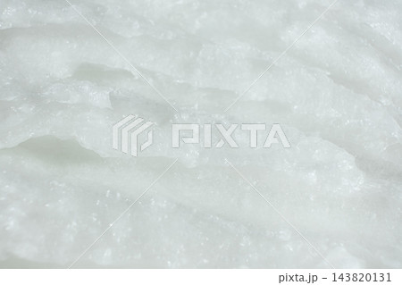 Detailed top view of unrefined solid coconut fat texture Detailed top view of unrefined solid coconut fat texture 143820131