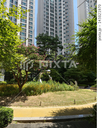 It is an outdoor park within the apartment complex.	 143821970