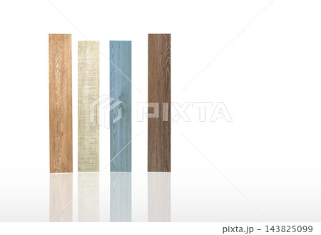 Four wood pattern vinyl flooring plank samples in brown, beige and blue isolated on white background, PVC material collection for interior design, home renovation and modern floor selection. Four wood pattern vinyl flooring plank samples in brown, beige and blue isolated on white background, PVC material collection for interior design, home renovation and modern floor selection. 143825099