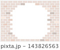 レンガの壁が丸くくり抜かれたような遊び心のある円形コピースペース付き背景素材 143826563
