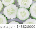 pile sliced cucumber isolated on white background 143828000