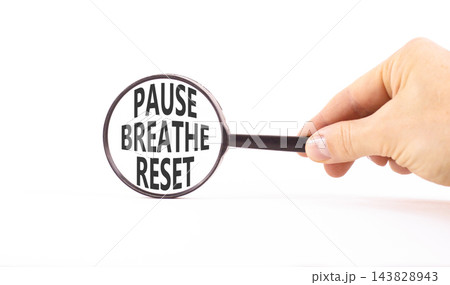 Pause breathe reset words symbol. Concept words Pause breathe reset in beautiful magnifying glass. Beautiful white background. Business support motivational and pause breathe reset concept. Copy space 143828943