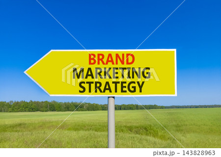 Brand marketing strategy words symbol. Concept words Brand marketing strategy on beautiful yellow road sign. Beautiful blue sky background. Business brand marketing strategy concept. Copy space. Brand marketing strategy words symbol. Concept words Brand marketing strategy on beautiful yellow road sign. Beautiful blue sky background. Business brand marketing strategy concept. Copy space. 143828963