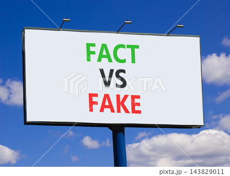 Fact vs versus fake words symbol. Concept words Fact vs Fake on beautiful white billboard. Beautiful blue sky background. Business and fact vs versus fake concept. Copy space. Fact vs versus fake words symbol. Concept words Fact vs Fake on beautiful white billboard. Beautiful blue sky background. Business and fact vs versus fake concept. Copy space. 143829011