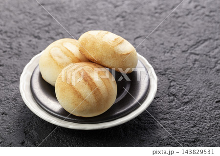 Delicious and nutritious almojabanas or pandebono, a food based on cassava flour and cheese Delicious and nutritious almojabanas or pandebono, a food based on cassava flour and cheese 143829531