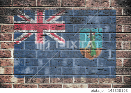 Montserrat flag on old brick wall background 143830198