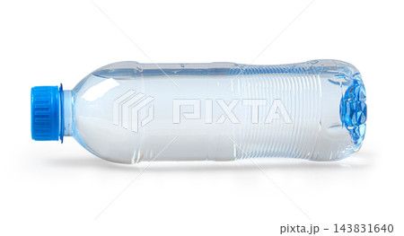 Clear plastic water bottle with blue cap lying horizontally Clear plastic water bottle with blue cap lying horizontally 143831640