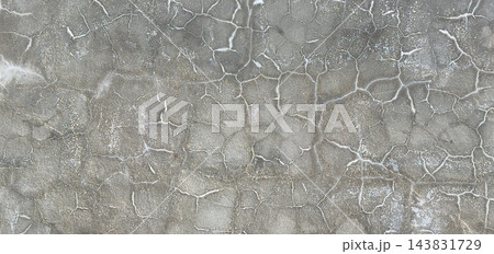 Cracked gray concrete wall with weathered texture 143831729