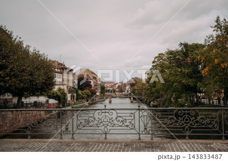 Strasbourg, France, scenic canal and historic buildings in autumn 143833487