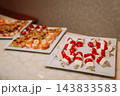 Caprese skewers with mozzarella and cherry tomatoes at a catering buffet 143833583
