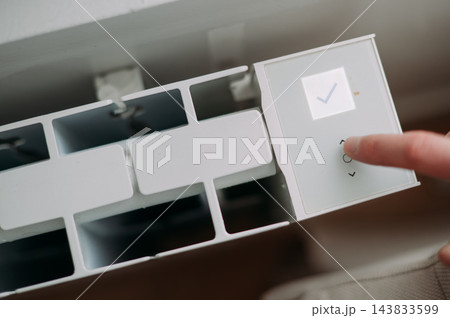 Adjusting radiator heating temperature with a digital thermostat in a home Adjusting radiator heating temperature with a digital thermostat in a home 143833599
