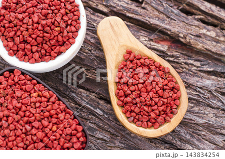 Seeds of achiote, originating from central america and parts of south america is used to season food 143834254