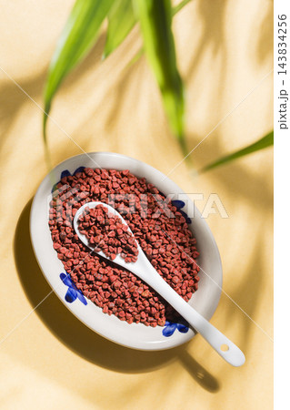 Experience the Bold and Distinctive Flavor of Annatto Seeds in Your Cooking 143834256