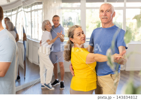 Couple of elderly man and woman dancing waltz Couple of elderly man and woman dancing waltz 143834812