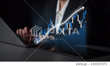 Business professional analyzing financial data with a laptop displaying a rising graph, showcasing growth trends and digital technology in the workplace Copula Business professional analyzing financial data with a laptop displaying a rising graph, showcasing growth trends and digital technology in the workplace Copula 143837071