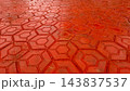 Wet Red Hexagonal Paving Block Pedestrian Walkway Perspective Texture Background    143837537