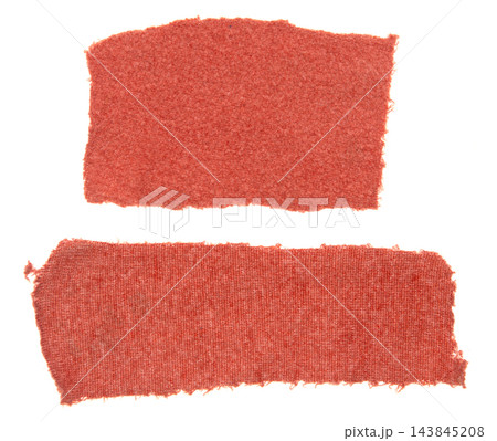 Red fabric swatches on clean white background 143845208