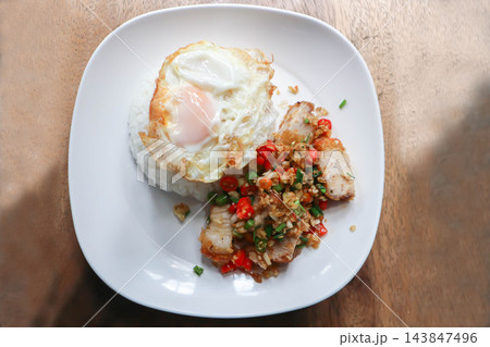 stir fried pork or deep fried pork , fried pork and rice or pork and rice stir fried pork or deep fried pork , fried pork and rice or pork and rice 143847496