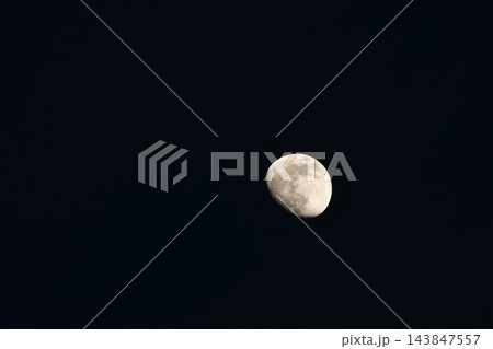 half moon floating on blue sky in twilight background at evening 143847557