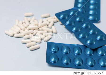 Capsules and blister packaging pharmaceutical concept Capsules and blister packaging pharmaceutical concept 143851274