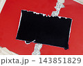 Torn red and black paper reveals music sheet beneath, paper collage with rough edges, layered composition. Natural background of paper for music poster, album cover, event design, branding 143851829