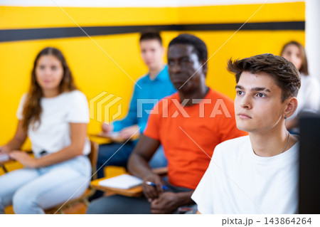 Young man in school for taxi drivers Young man in school for taxi drivers 143864264