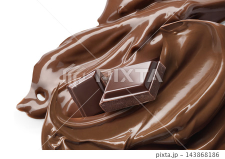 Two square chocolate pieces on glossy melted cocoa butter swirl 143868186