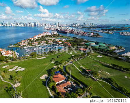 Miami, Florida, USA - June 07, 2024: Fisher island aerial view. Panorama aerial drone view of Fisher island, Miami. Miami beach from drone. Miami panorama, Florida. Panoramic view of Fisher island 143870151