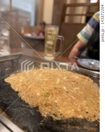 熱々のもんじゃ焼き 熱々のもんじゃ焼き 143872204