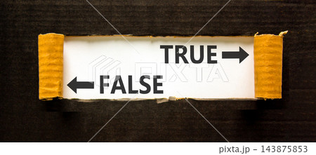 True or false symbol. Concept word True or False on beautiful white paper. Beautiful black background. Business and true or false concept. Copy space. True or false symbol. Concept word True or False on beautiful white paper. Beautiful black background. Business and true or false concept. Copy space. 143875853