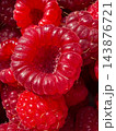 Juicy sweet red ripe raspberries texture 143876721