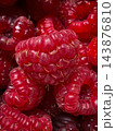 Macro view of sweet red ripe raspberries texture 143876810