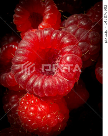 Close up of fresh ripe raspberries pattern background Close up of fresh ripe raspberries pattern background 143876902