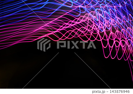 Cyber Monday. Neon pink and blue light trails creating abstract motion 143876946