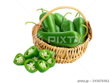 jalapeno pepper in wicker basket isolated on white background. Green chili pepper with full depth of field. 143878362